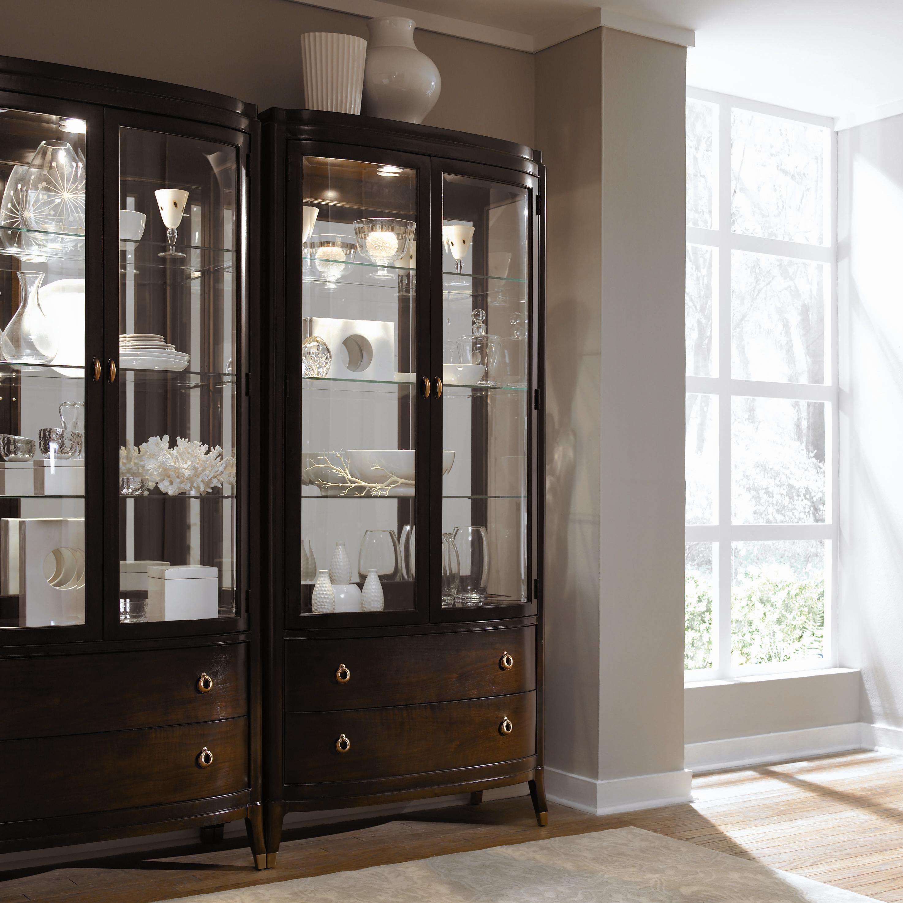 Raymour and top flanigan curio cabinets